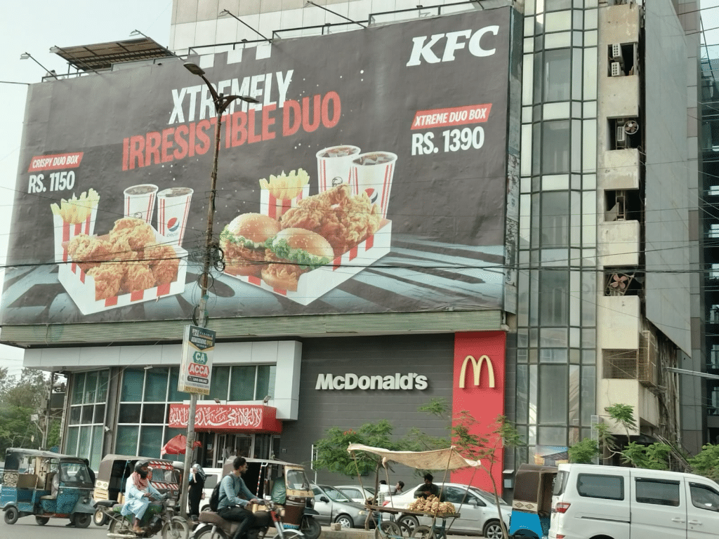 Marketing Stunt! KFC Places Billboard Ad above McDonald's in Karachi